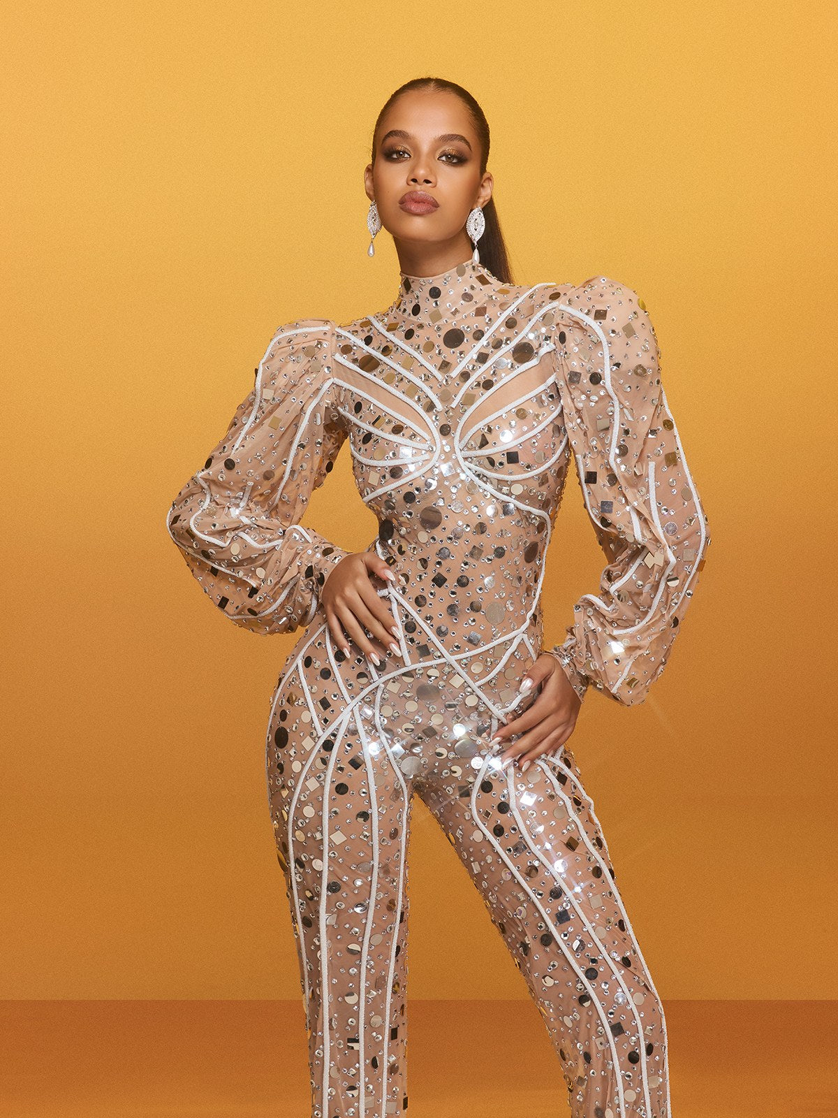 Zylar Long Sleeve Embellished Jumpsuit In Nude